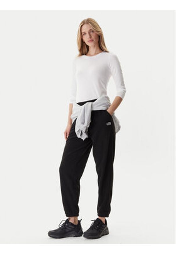 The North Face Spodnie dresowe Glacier NF0A8DQR Czarny Regular Fit. Kolor: czarny. Materiał: syntetyk