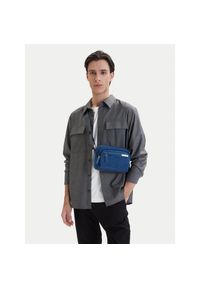 Saszetka Calvin Klein. Kolor: niebieski. Materiał: denim #1