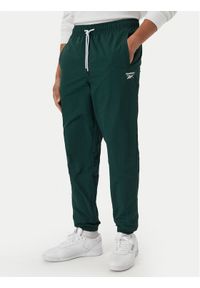 Reebok Spodnie dresowe Mieszko RK25722CCM Zielony ciemny Regular Fit. Kolor: zielony. Materiał: syntetyk #1