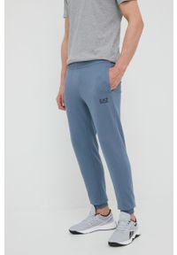 EA7 Emporio Armani - Spodnie. Kolor: niebieski. Materiał: dzianina