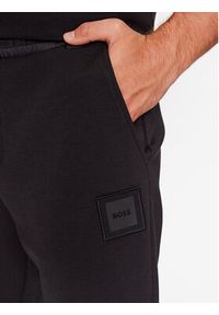 BOSS - Boss Spodnie dresowe Hover Lotus 50499064 Czarny Regular Fit. Kolor: czarny. Materiał: syntetyk, dresówka