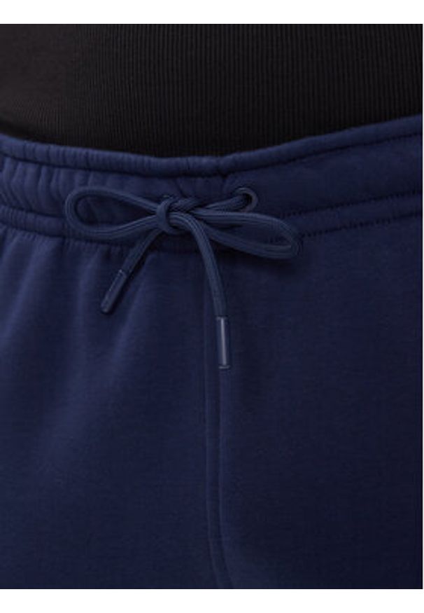 Nike Spodnie dresowe FV7277 410 Granatowy Regular Fit. Kolor: niebieski. Materiał: bawełna