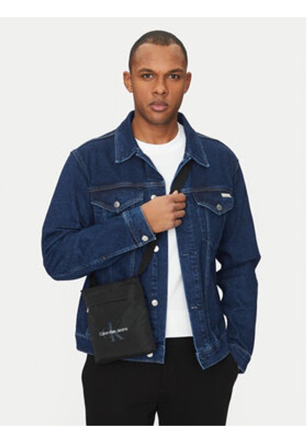 Calvin Klein Jeans Saszetka Sport Essentials Flatpack 18 LV04G3030G Czarny. Kolor: czarny. Materiał: materiał