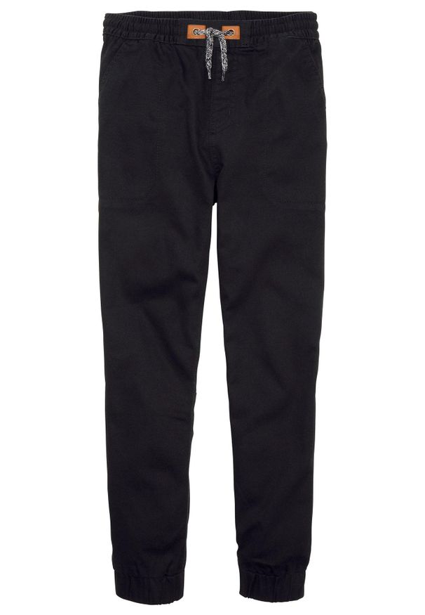 bonprix - Spodnie chłopięce ocieplane z podszewką z dżerseju, regular fit. Kolor: czarny. Materiał: jersey, bawełna. Styl: sportowy