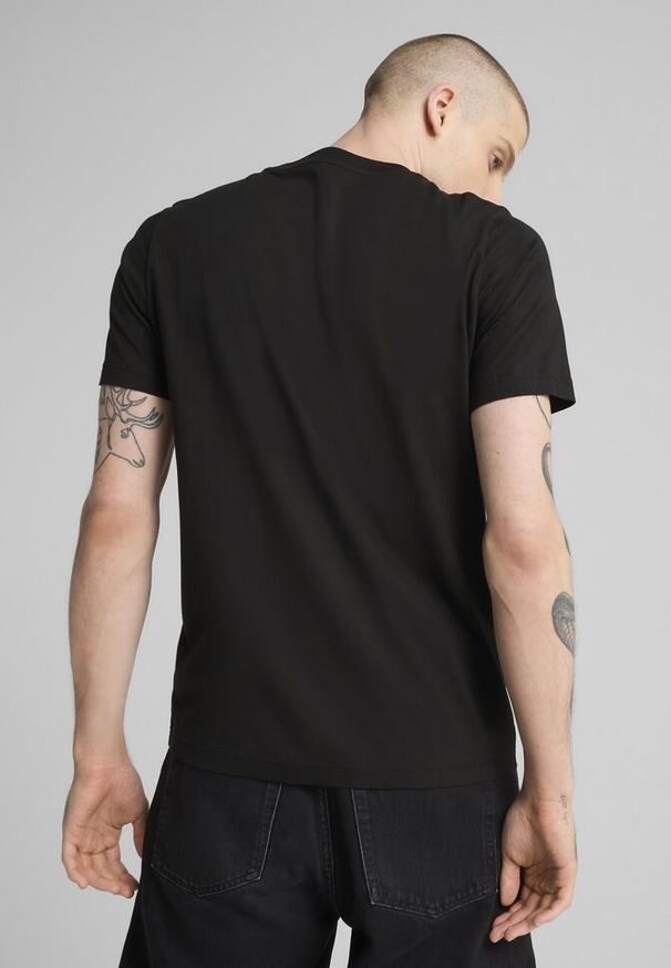 Puma - Męska koszulka z grafiką PUMATECH PUMA Black. Kolor: czarny. Materiał: guma. Wzór: nadruk, kolorowy