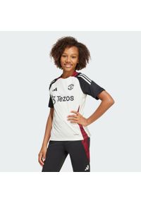 Adidas - Koszulka Manchester United Tiro 24 Training Kids. Kolor: biały, czarny, wielokolorowy. Materiał: materiał
