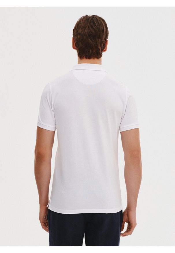 Pako Lorente - PAKO LORENTE - Biały gładki t-shirt polo. Okazja: na co dzień. Typ kołnierza: polo. Kolor: niebieski, biały, czarny. Materiał: bawełna. Wzór: gładki. Styl: casual