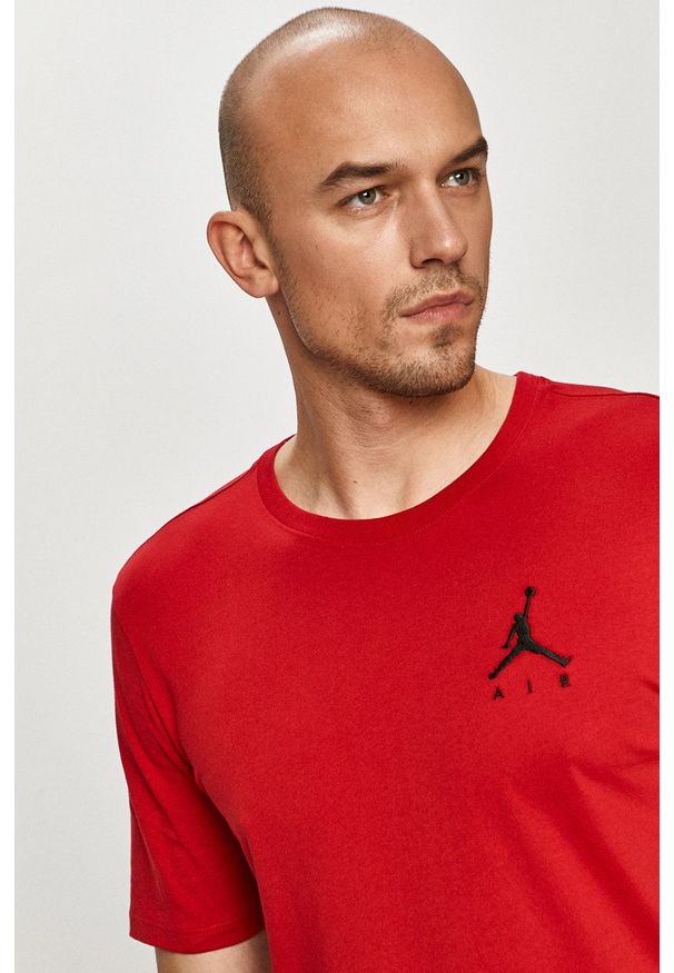 Jordan - T-shirt. Okazja: na co dzień. Kolor: czerwony. Wzór: nadruk. Styl: casual