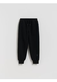 Reserved - Bawełniane joggery z meszkiem - czarny. Kolor: czarny. Materiał: bawełna