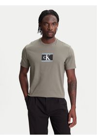 Calvin Klein T-Shirt Box Tape Graphic LV04RC854G Zielony Regular Fit. Kolor: zielony. Materiał: bawełna
