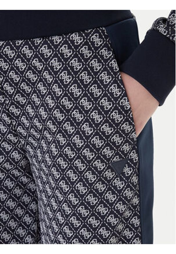 Guess Spodnie dresowe V6RB09 K2042 Granatowy Wide Leg. Kolor: niebieski. Materiał: syntetyk