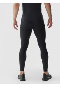 4f - 4F Legginsy treningowe ze średnim stanem męskie - czarne L. Kolor: czarny. Materiał: dzianina, włókno, poliester, materiał, elastan. Wzór: gładki, ze splotem, jednolity. Sport: fitness