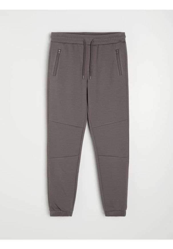 Sinsay - Spodnie dresowe slim fit z domieszką wiskozy - szary. Kolor: szary. Materiał: dresówka, wiskoza