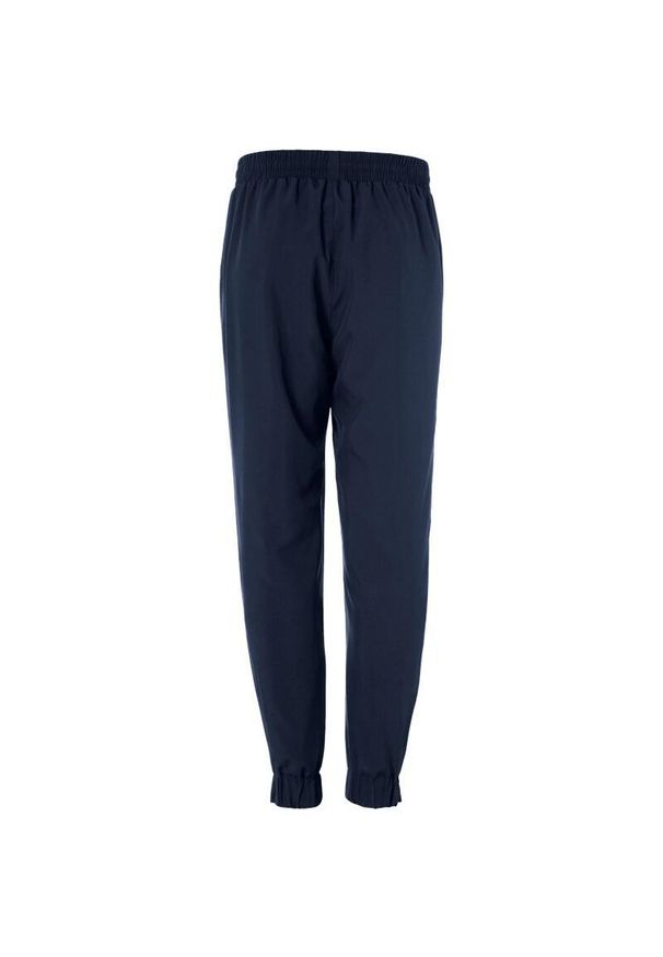 UHLSPORT - Spodnie dresowe Uhlsport woven. Kolor: niebieski. Materiał: dresówka. Sport: piłka nożna