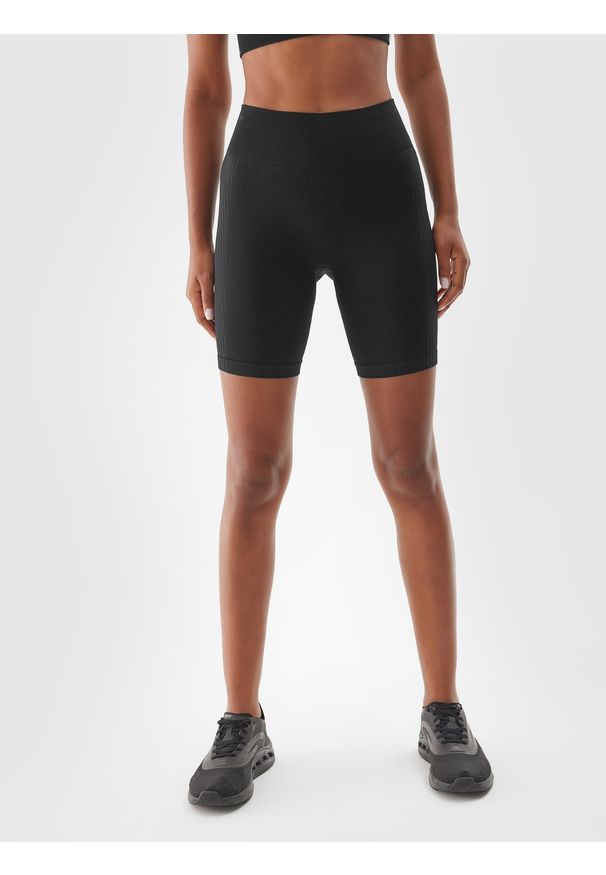 4f - 4F Legginsy kolarki treningowe damskie - czarne M/L. Stan: podwyższony. Kolor: czarny. Materiał: dzianina, włókno, syntetyk, materiał, elastan. Długość: krótkie. Wzór: jednolity. Sport: fitness