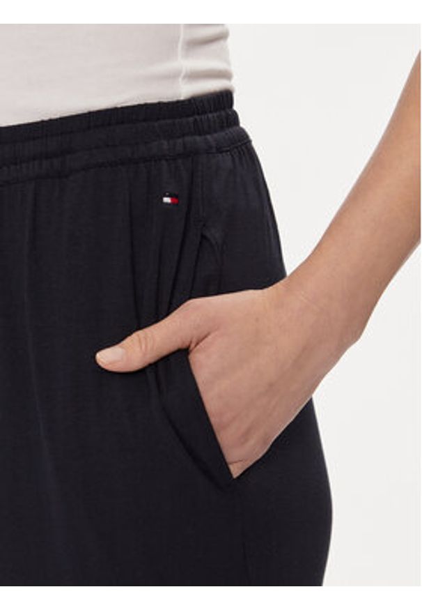 TOMMY HILFIGER - Tommy Hilfiger Spodnie dresowe UW0UW05195 Granatowy Relaxed Fit. Kolor: niebieski. Materiał: dresówka