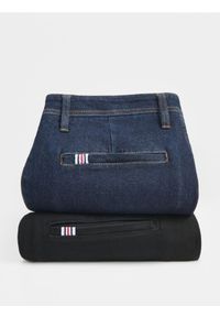 Reserved - Jeansy chino slim fit - granatowy. Kolor: niebieski