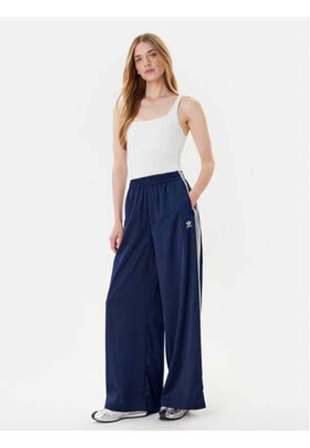 Adidas - adidas Spodnie dresowe adicolor Satin JD0881 Granatowy Wide Leg. Kolor: niebieski. Materiał: syntetyk