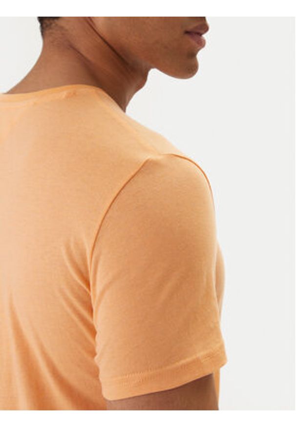 Tommy Jeans T-Shirt DM0DM20363 Pomarańczowy Slim Fit. Kolor: pomarańczowy. Materiał: bawełna