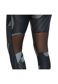 Spodnie do biegania damskie Nike Fast Tight 7/8 Runway CU3114. Materiał: materiał, poliester, skóra. Technologia: Dri-Fit (Nike). Wzór: nadruk #3