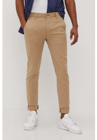 Levi's® - Levi's Spodnie męskie kolor beżowy. Okazja: na spotkanie biznesowe. Kolor: beżowy. Materiał: bawełna, tkanina. Wzór: gładki. Styl: biznesowy