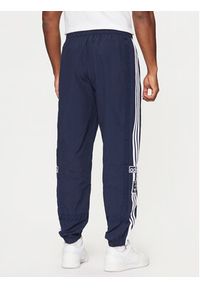 Adidas - adidas Spodnie dresowe Adibreak JD4258 Granatowy Loose Fit. Kolor: niebieski. Materiał: syntetyk #3
