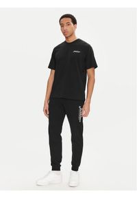 Jack & Jones - Jack&Jones Komplet t-shirt i spodnie dresowe Beau 12277849 Czarny Relaxed Fit. Kolor: czarny. Materiał: bawełna