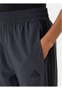 Adidas - adidas Spodnie dresowe Train Essentials 3-Stripes Woven KC5496 Czarny Regular Fit. Kolor: czarny. Materiał: syntetyk #3