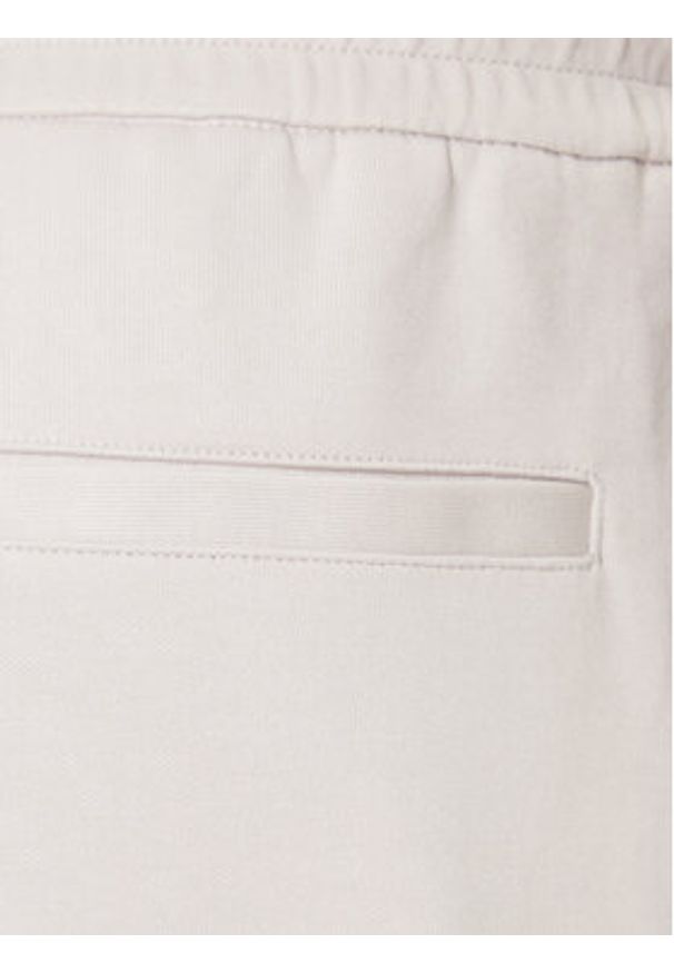 Armani Exchange Spodnie dresowe XM001358 AF16278 U1013 Écru Regular Fit. Materiał: syntetyk