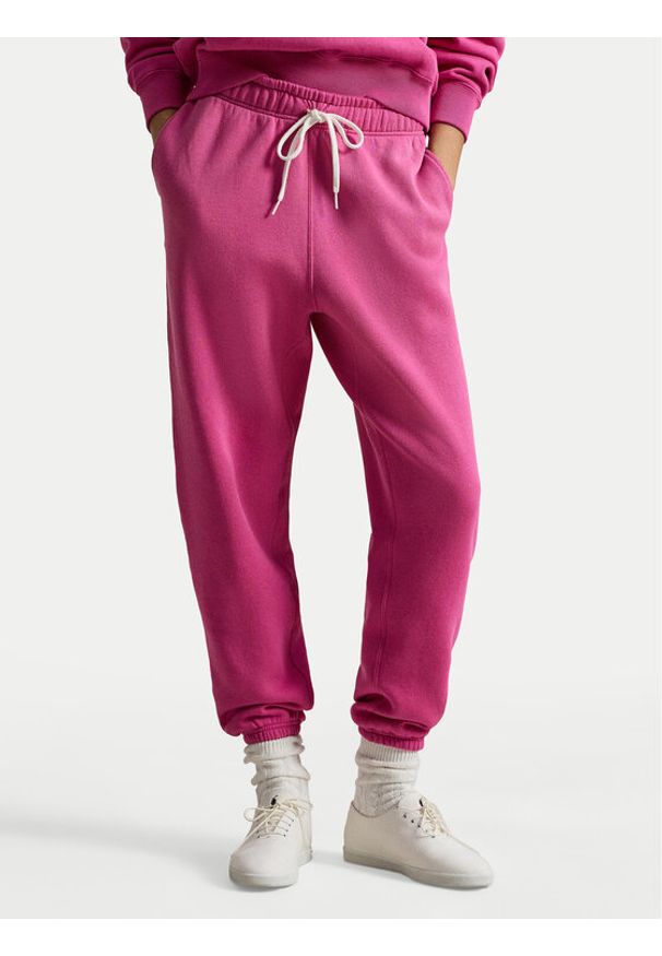 Polo Ralph Lauren Spodnie dresowe 211971700501 Różowy Tapered Fit. Kolor: różowy. Materiał: bawełna