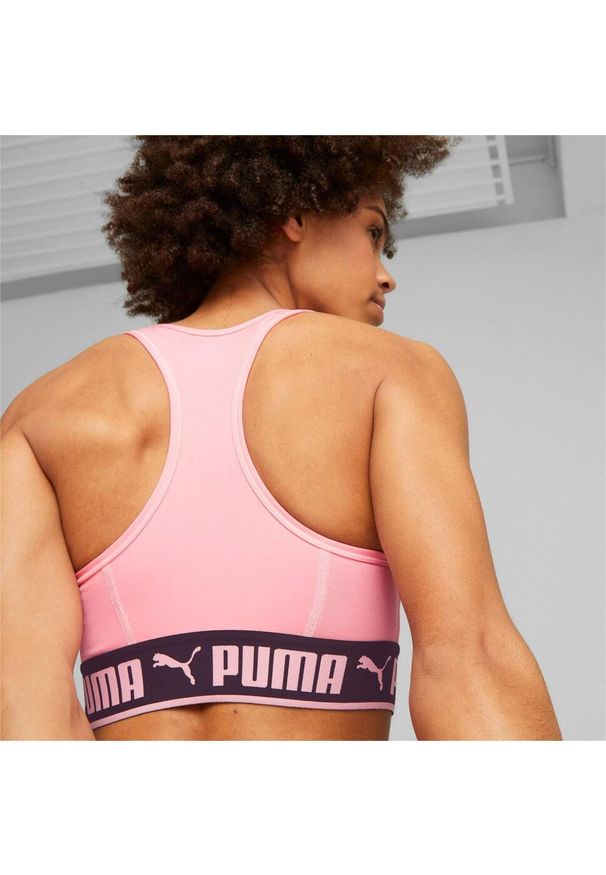 Stanik fitness cardio PUMA Mid Impact Puma Strong PM. Kolor: różowy. Materiał: poliester, materiał. Sport: fitness