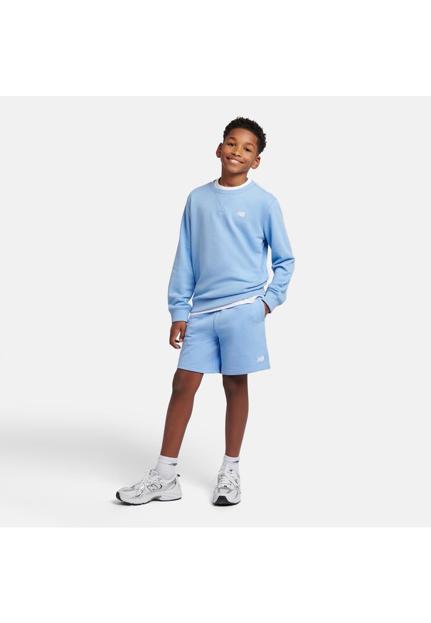 Spodenki dziecięce New Balance LAKB0008ELE – niebieskie. Kolor: niebieski. Materiał: bawełna. Styl: sportowy