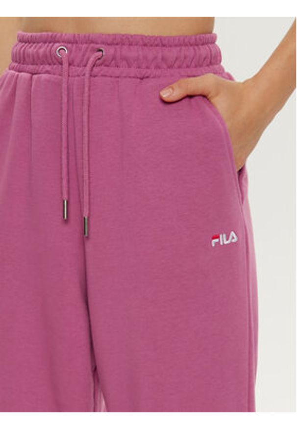 Fila Spodnie dresowe Buetzow FAW0701 Różowy Regular Fit. Kolor: różowy. Materiał: bawełna