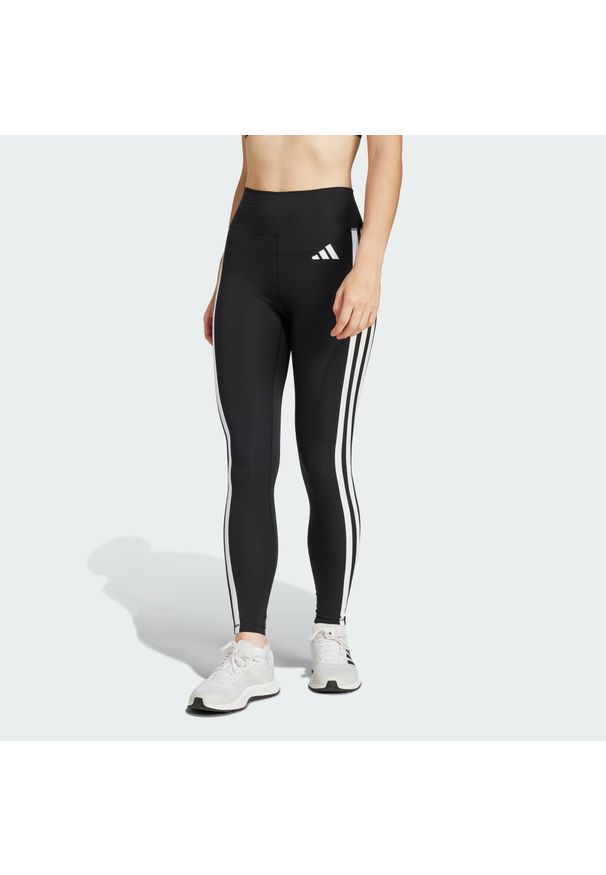 Adidas - Legginsy Optime Essentials 3-Stripes 7/8. Kolor: czarny, biały, wielokolorowy. Materiał: materiał. Technologia: ClimaCool (Adidas). Sport: fitness