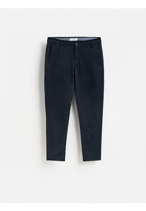 Reserved - Spodnie chino slim fit - granatowy. Kolor: niebieski. Materiał: bawełna, tkanina