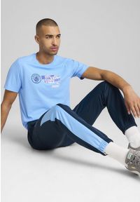 Puma - Męska koszulka Manchester City ftblNRGY PUMA Team Light Blue. Kolor: niebieski. Materiał: guma, bawełna. Wzór: nadruk