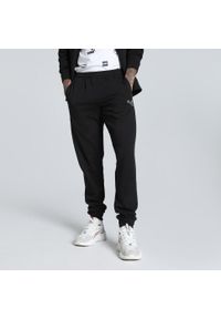 Puma - Męskie spodnie dresowe Better Essentials PUMA Black. Kolor: czarny. Materiał: dresówka. Sport: fitness