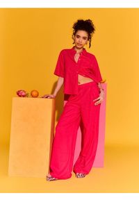 Sinsay - Spodnie wide leg z domieszką lnu - różowy. Kolor: różowy. Materiał: len