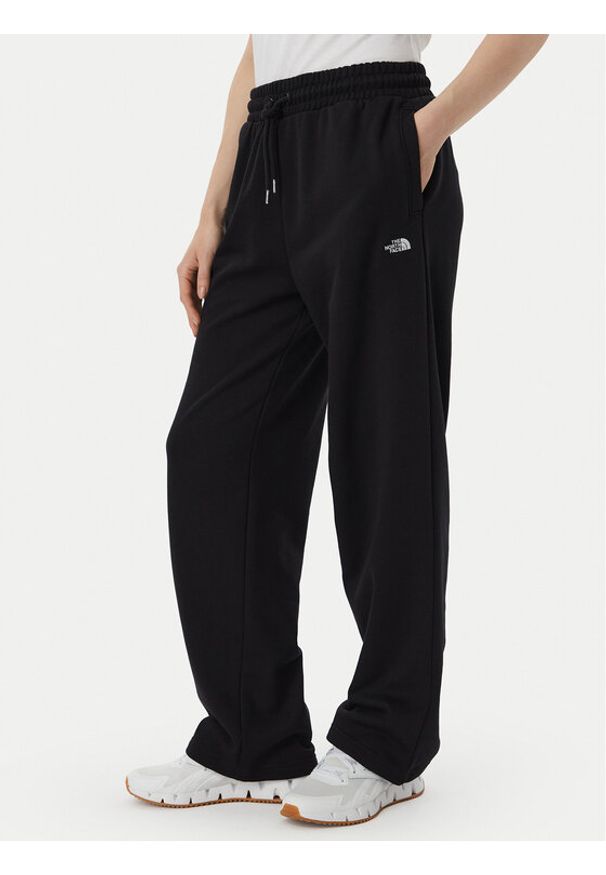 The North Face Spodnie dresowe Tnf Essential Terry Simple Dome Relaxe NF0A8FDS Czarny Regular Fit. Kolor: czarny. Materiał: bawełna
