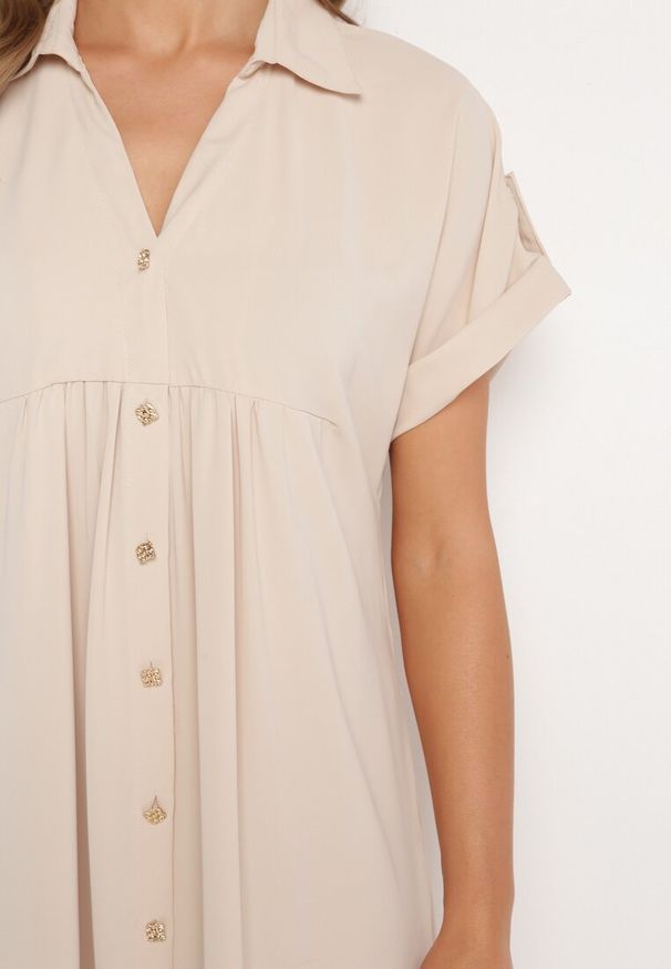 Born2be - Beżowa Sukienka Koszulowa Zapinana na Guziki z Podwijanymi Rękawami Moarisa. Okazja: na co dzień, na spotkanie biznesowe, do pracy. Typ kołnierza: dekolt w kształcie V. Kolor: beżowy. Typ sukienki: koszulowe. Styl: biznesowy, casual, elegancki