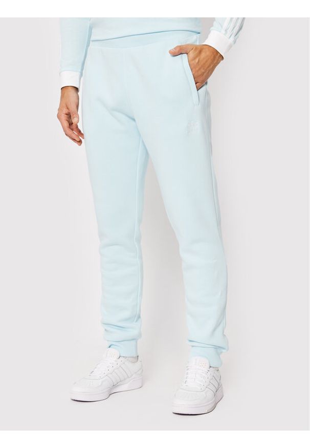 Adidas - Spodnie dresowe adidas. Kolor: niebieski. Materiał: dresówka
