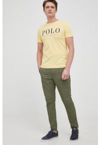 Polo Ralph Lauren t-shirt bawełniany kolor żółty gładki. Okazja: na co dzień. Typ kołnierza: polo. Kolor: żółty. Materiał: bawełna. Wzór: gładki. Styl: casual