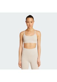 Adidas - Biustonosz adidas All Me Light Support. Kolor: beżowy. Sport: joga i pilates