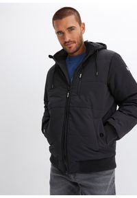 bonprix - Zimowa kurtka pikowana o kroju bomberki z kapturem. Typ kołnierza: kaptur. Kolor: czarny. Sezon: zima #1