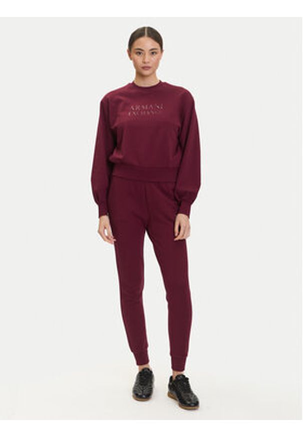 Armani Exchange Spodnie dresowe XW000986 AF16114 UA343 Bordowy Relaxed Fit. Kolor: czerwony. Materiał: bawełna