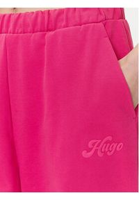 Hugo - HUGO Spodnie dresowe Nasuede_4 50541179 Różowy Relaxed Fit. Kolor: różowy. Materiał: bawełna