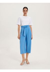Reserved - Spodnie culotte z wiązaniem - jasnoniebieski. Kolor: niebieski. Materiał: tkanina, wiskoza. Wzór: gładki #1