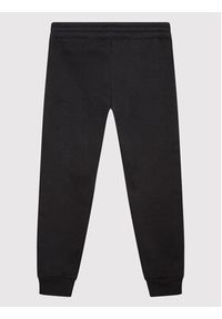Champion Spodnie dresowe 404471 Czarny Regular Fit. Kolor: czarny. Materiał: syntetyk