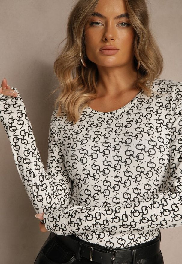 Renee - Czarno-Biała Bluzka Longsleeve z Bawełny Ozdobiony Literowym Wzorem Javelina. Okazja: na co dzień. Kolor: czarny. Materiał: bawełna. Długość rękawa: długi rękaw. Wzór: aplikacja. Styl: klasyczny, casual, elegancki