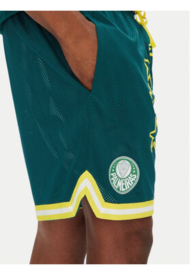 Puma Szorty sportowe 631703 Zielony Regular Fit. Kolor: zielony. Materiał: syntetyk